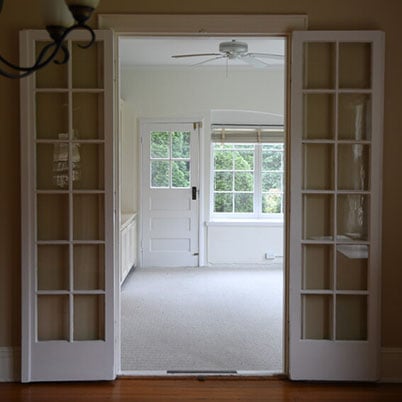 Hilton Carter kitchen to living room view - before shot