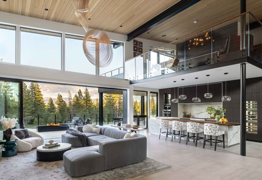 Modern living space with large big doors and stunning bar set up